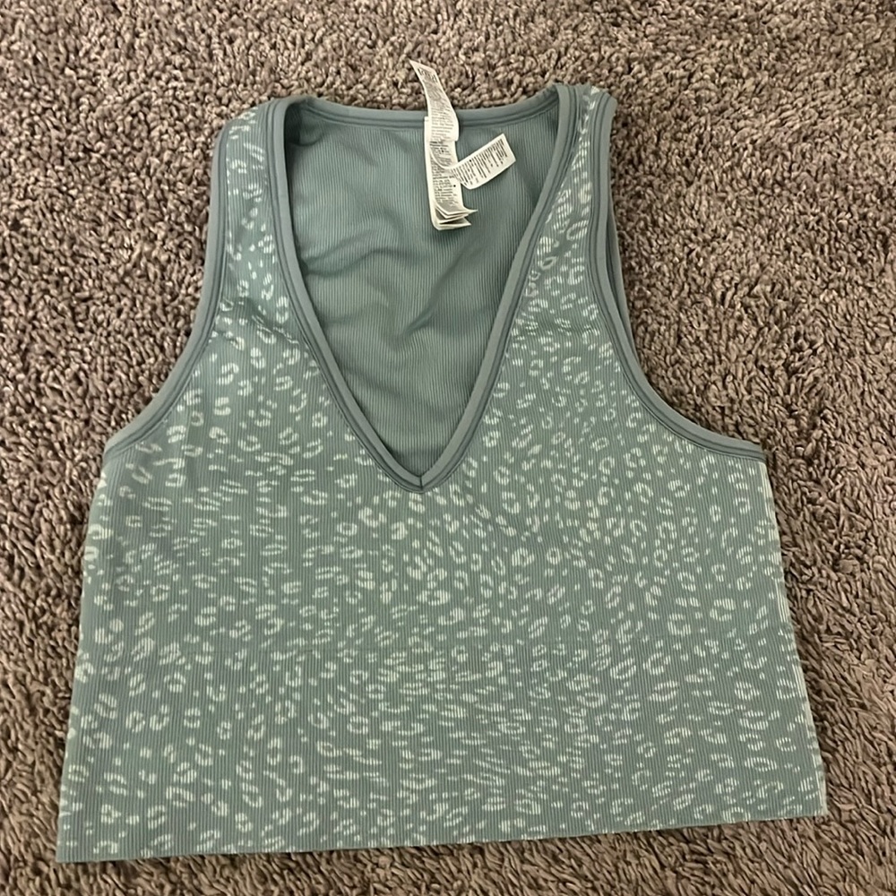 Dark mint green with cheetah print Athleta top